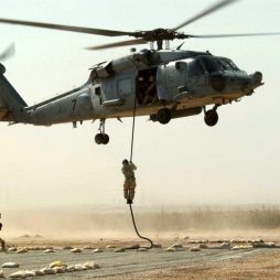 Operators fast roping from the 160th SOAR (A) helicopter