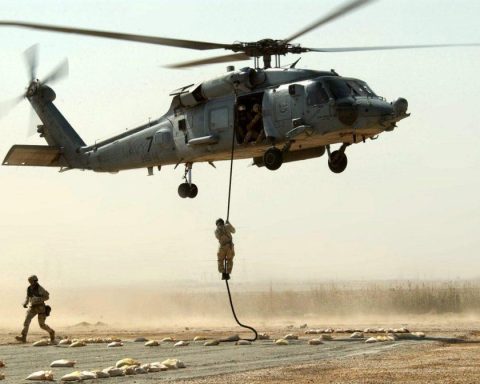 Operators fast roping from the 160th SOAR (A) helicopter