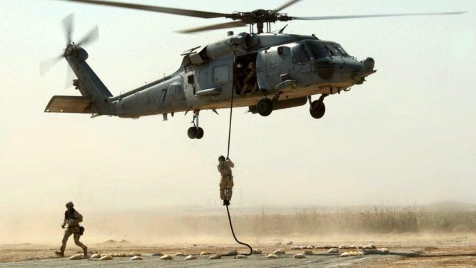 Operators fast roping from the 160th SOAR (A) helicopter