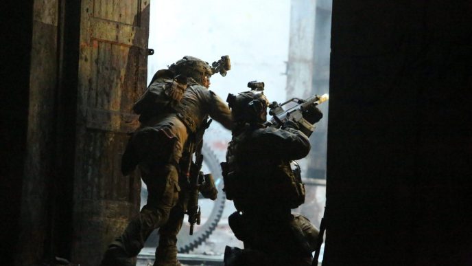 Operators from Estonian K-Commando providing suppressive fire during the exercise