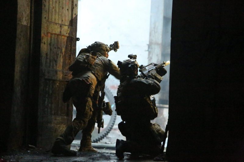 Operators from Estonian K-Commando providing suppressive fire during the exercise