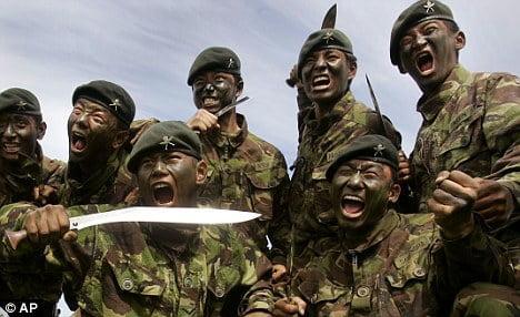 British gurkha regiment posing for picture with khukri knife