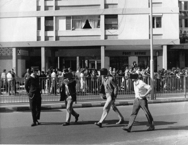 Three SAS operators disguised in plain clothes leave the scene after shooting dead three provisional IRA members in Gibraltar during Operation Flavius in 1988