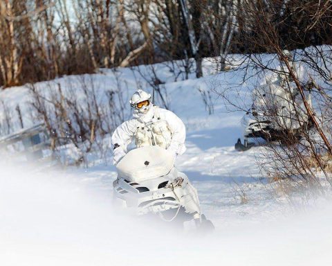 Member of the Finmark 7th Jager Company on snowmobile