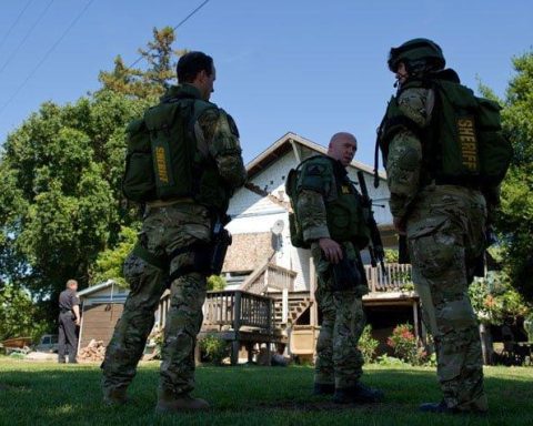 Sacramento Sheriff's Department Special Enforcement Detail (SED) operators executing the high-risk search warrant