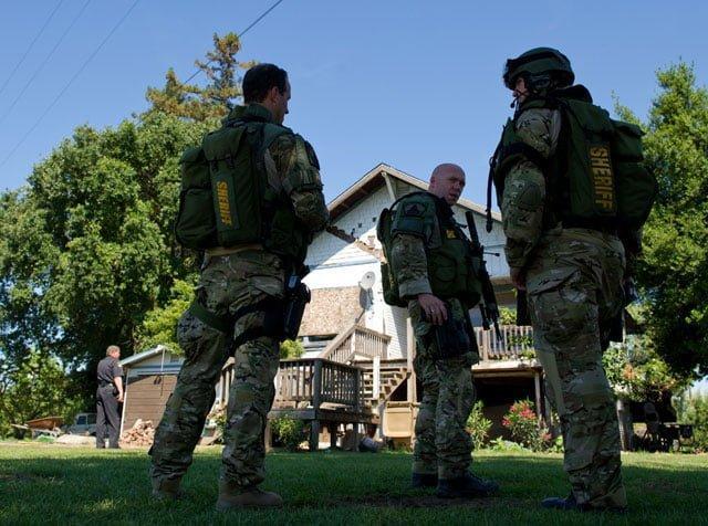 Sacramento Sheriff's Department Special Enforcement Detail (SED) operators executing the high-risk search warrant