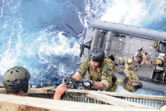 US Navy SEALs boarding ship