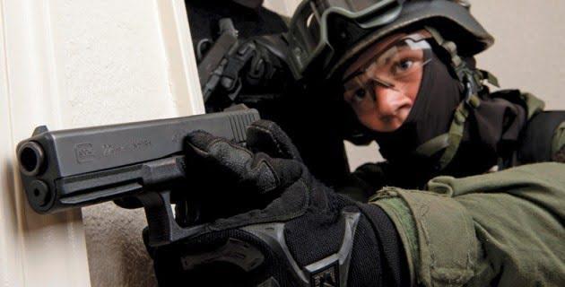 SWAT operators are often waring balaclavas or other face-covers in order to conceal their identities