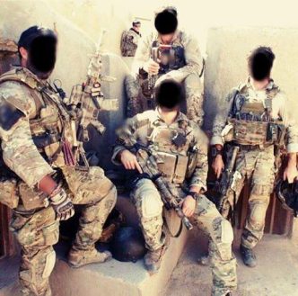 Special Air Service - SAS operators are posing with their weaponry