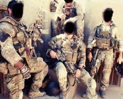 Special Air Service - SAS operators are posing with their weaponry