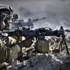 IDF infantry soldier firing from IWI Negev light machine gun