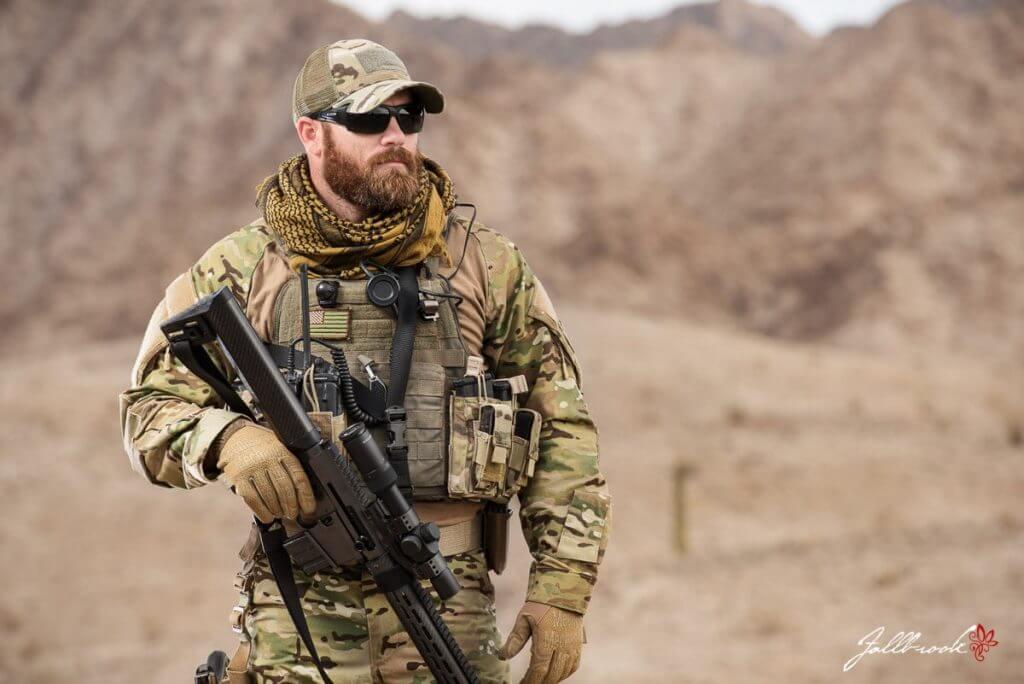 SOF Operator dressed in combat uniform with a beard