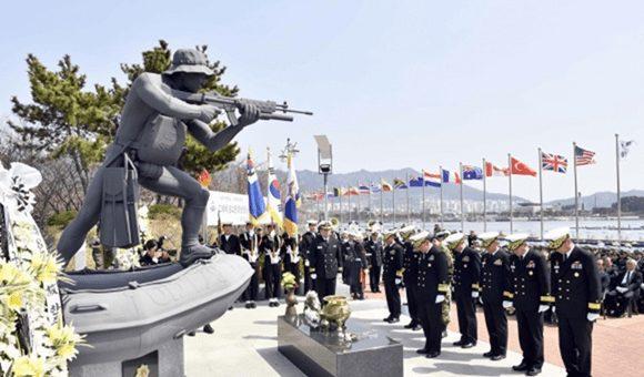 ROK Navy Admirals pay respects to Joo Ho Han in front of one of his many statues