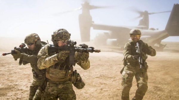 A joint special forces team move together out of a U.S. Air Force CV-22 Osprey Feb. 26, 2018, at Melrose Training Range, New Mexico. At Emerald Warrior, the largest joint and combined special operations exercise, U.S. Special Operations Command forces train to respond to various threats across the spectrum of conflict.