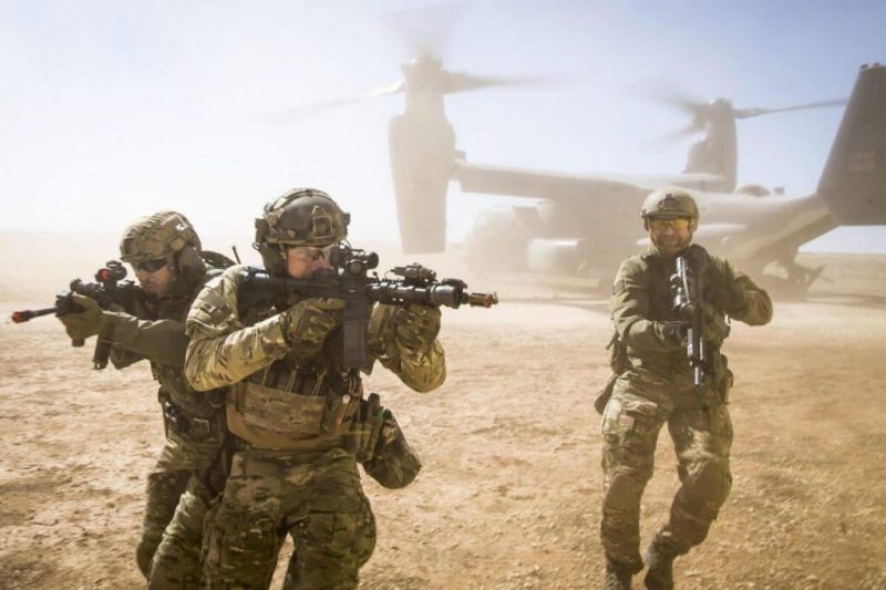 A joint special forces team move together out of a U.S. Air Force CV-22 Osprey Feb. 26, 2018, at Melrose Training Range, New Mexico. At Emerald Warrior, the largest joint and combined special operations exercise, U.S. Special Operations Command forces train to respond to various threats across the spectrum of conflict.