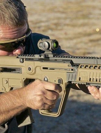 Soldier aim with its IWI Tavor assault rifle