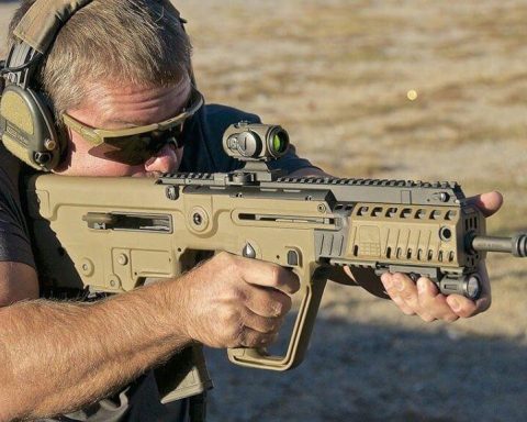 Soldier aim with its IWI Tavor assault rifle