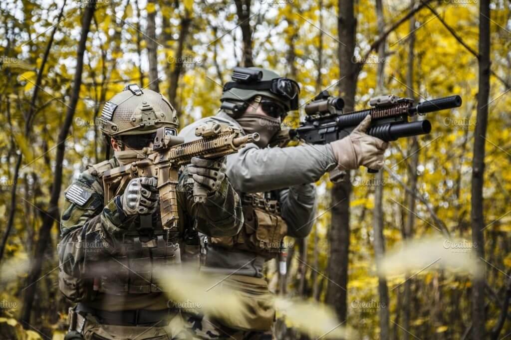 MARSOC Raiders aiming their weapons during the training