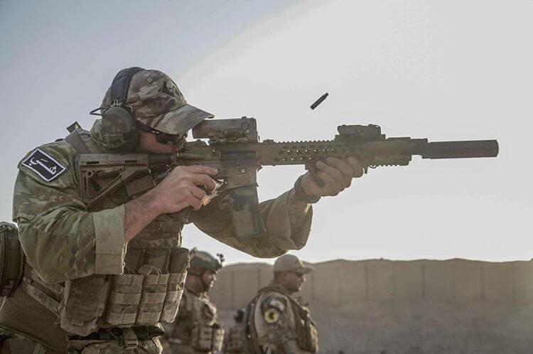 U.S. Army Special Forces Green Beret firing from M4 in Afghanistan