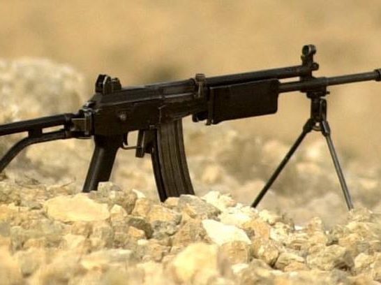 IMI Galil ARM chambered in 5.56 mm with bipod deployed