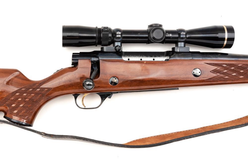 Nikko Model 7000 Bolt Action with mounted scope