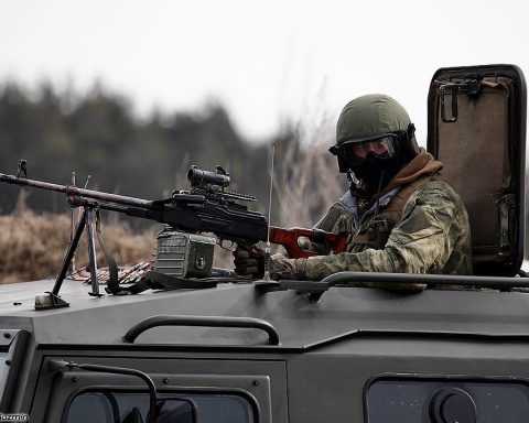 Russian police officer with a PK machine gun