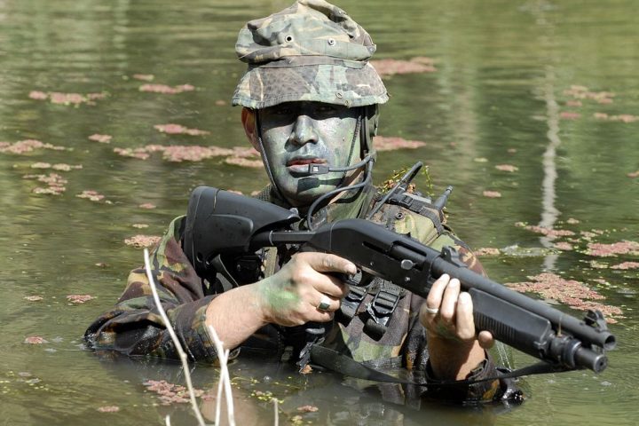 A New Zealand Army soldier armed with a Benelli M3 Super 90