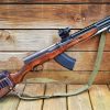 SKS rifle with 30 round magazine and installed optical sight