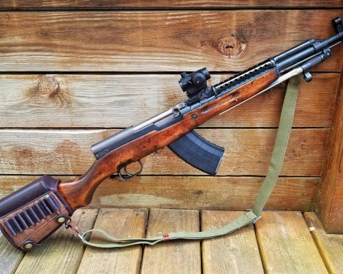 SKS rifle with 30 round magazine and installed optical sight