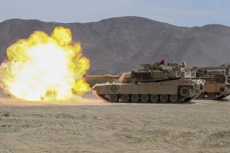 M1A1 Abrams fires its main gun