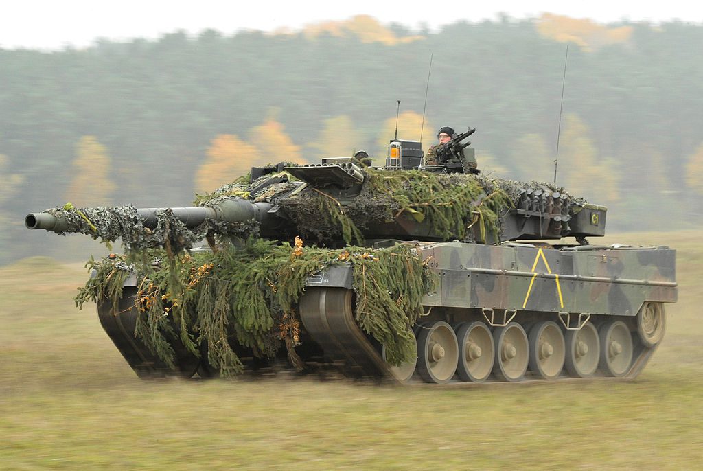 A German Army Leopard 2A6, assigned to the 104th Panzer Battalion conducting high-speed manoeuvres.