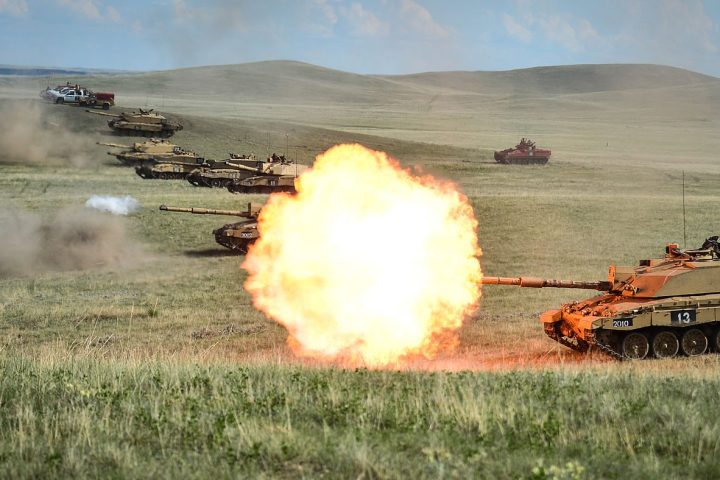 Row of Challenger 2 on a firing range at BATUS, Canada