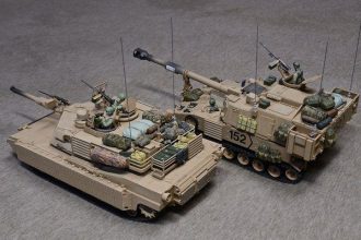 Although models, these two vehicles show why the self propelled gun (right) is often confused with the tank (left) by the average person