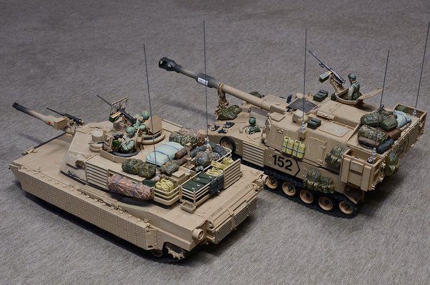 Although models, these two vehicles show why the self propelled gun (right) is often confused with the tank (left) by the average person