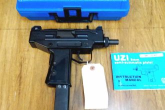 Uzi pistol chambered for 9 mm rounds