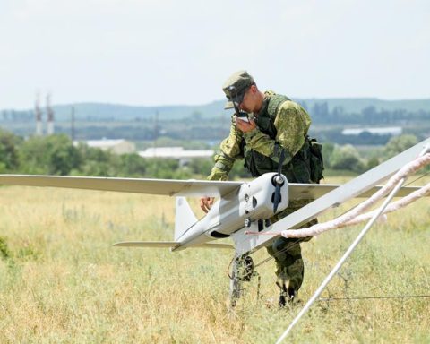 A Russian soldier inspects Orlan-10 drone