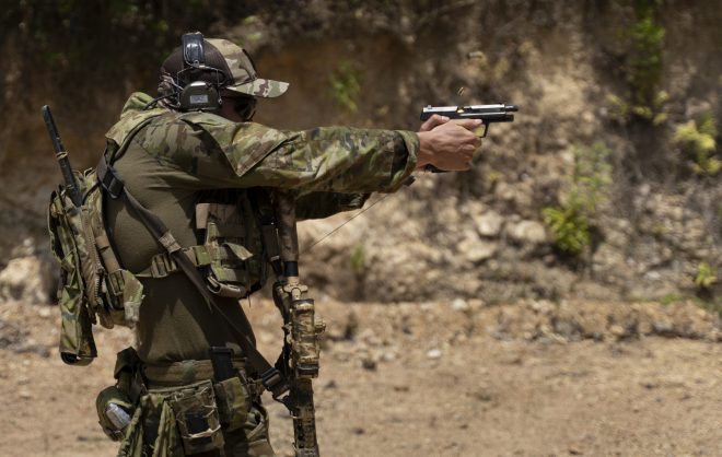 US Navy SEAL firing his sidearm at the shooting range in Philippines