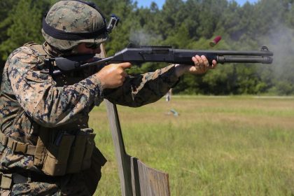 Soldier fires Benelli M4 tactical shotgun