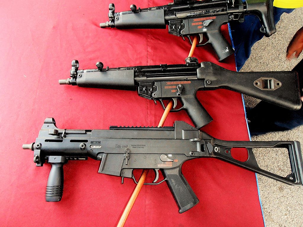 A Heckler & Koch MP5A5 (from top), MP5A4 and UMP9, on display at a Navy armory exhibition