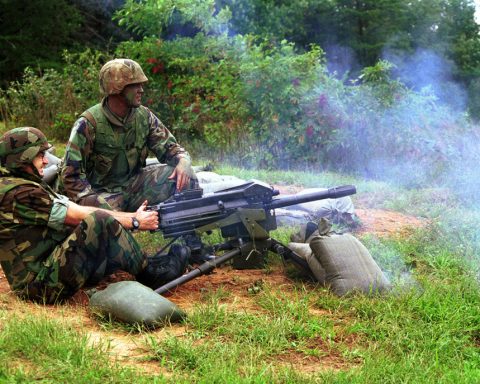 g from Mk 19 40 mm grenade launcher mounted on M3 tripod during a training exercise