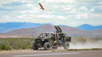 A light vehicle fitted with a pair of Pneumatically Integrated Launch Systems (PILS) launches an ALTIUS-600 as part of a U.S. Army test