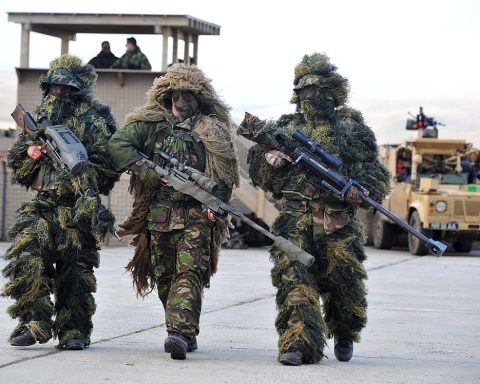 British snipers with L115A3 Long Range Rifle with suppressor