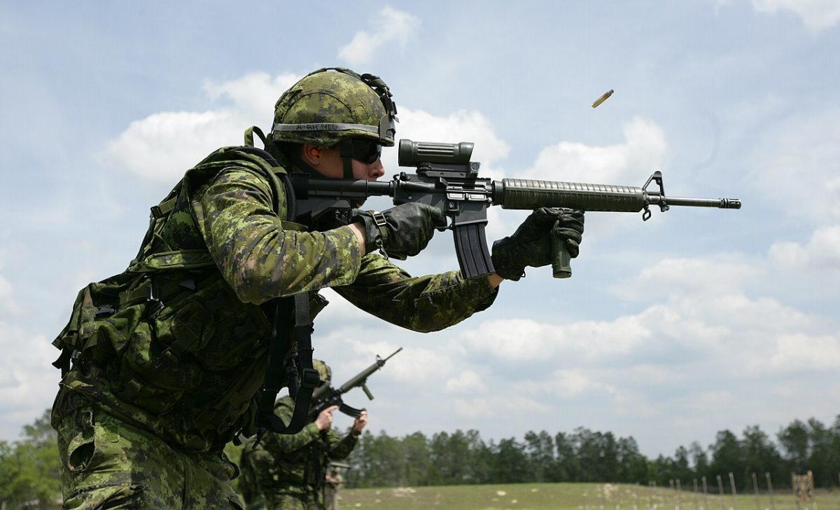 Canadian soldier preparing ammunition for rifle drills at Partnership of the Americas 2009