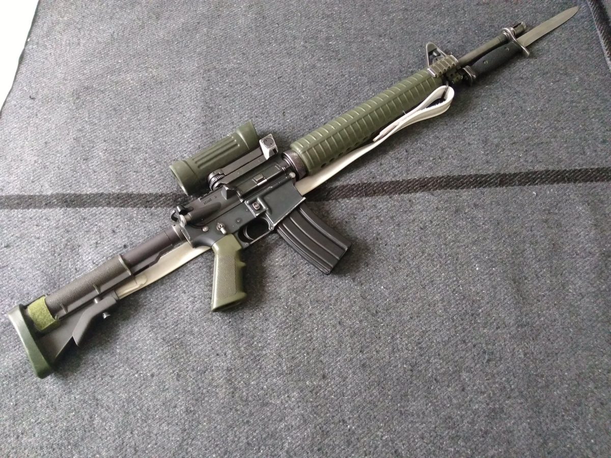 Colt Canada C7 rifle laying on the floor
