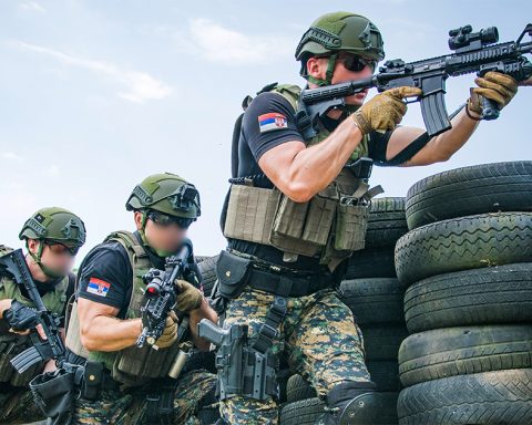 Serbian police officers armed with Colt M4 Commando rifles during training drill