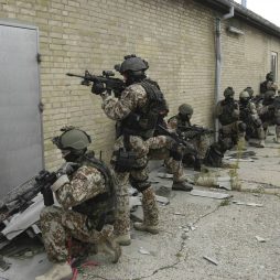 Frogman Corps (Frømandskorpset) operators preparing to breach the building