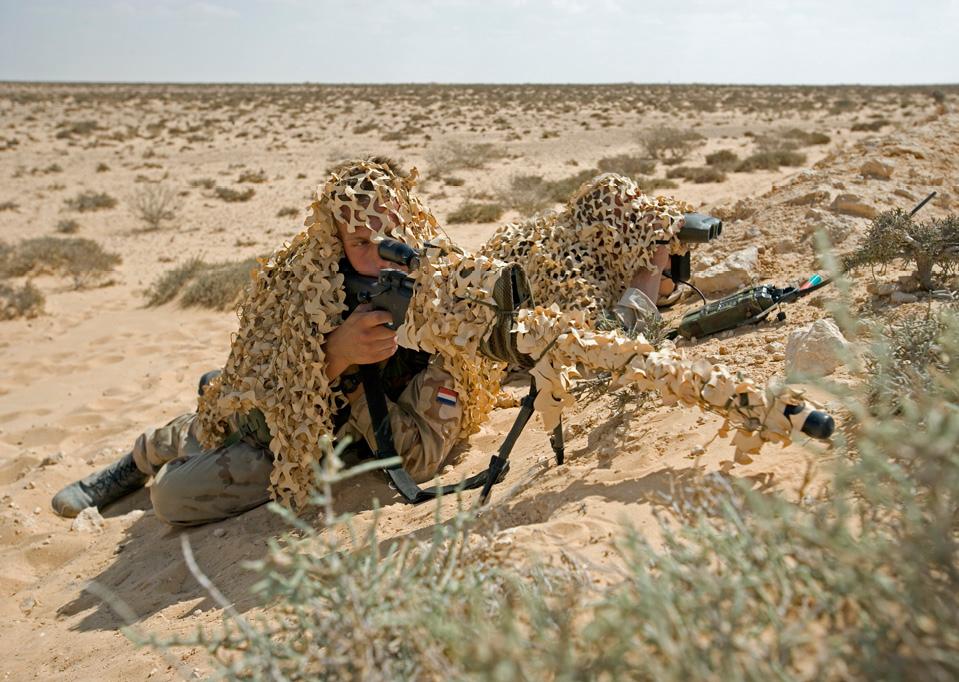 A Dutch ISAF sniper team with an Accuracy International AWM .338 Lapua Magnum rifle