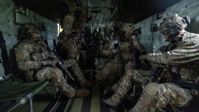An elite operators of the Denmark's Jaeger Corps inside the helicopter