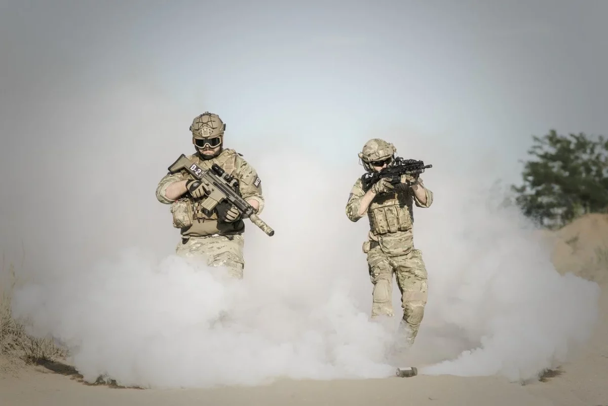 SASR operators moving through the smoke during the exercise