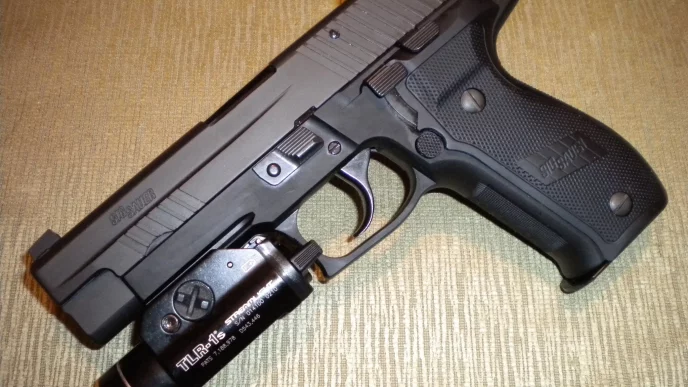 Sig Sauer M11 with TLR-1 flashlight attached